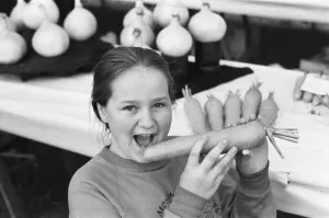 Reading show, in Reading Berkshire. (Picture) Girl holding a carrot at the show Reading show, in Reading Berkshire. (Picture) Girl holding a carrot at the show