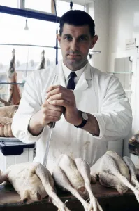 00492 Gallery: Referee Jack Taylor pictured in his job as a butcher in Wolverhampton, 1970