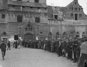 Refugees from the fighting seen here queuing outside the City Hall in Malines waiting for Refugees from the fighting seen here queuing outside the City Hall in Malines waiting for