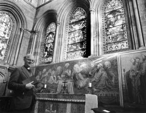 The Rev Gready at the altar rail which shows the mosaic by artist John Dobbin The Rev Gready at the altar rail which shows the mosaic by artist John Dobbin