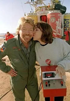 Images Dated 7th January 1997: Richard Branson is kissed by one of the ground crew Virgin Global Challenger balloon