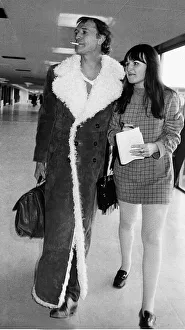 Richard Harris Irish actor at Heathrow airport 1970 with arm around female Richard Harris Irish actor at Heathrow airport 1970 with arm around female