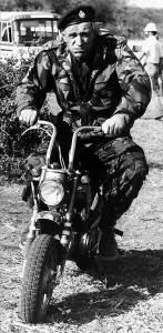Images Dated 23rd October 1977: Richard Harris Irish actor on set of film Wild Geese 1977 riding motorcycle in army