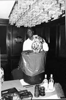 Images Dated 14th December 1992: Riddick Bowe Boxer The Undisputed World Heavyweight Championship Puts His WBC Belt Into