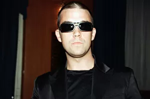Images Dated 23rd July 1997: Robbie Williams attending the Elite Model Look of the Year competition, Connaught Rooms