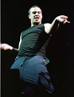 Images Dated 28th February 1999: Robbie Williams in concert at Wembley Arena February 1998