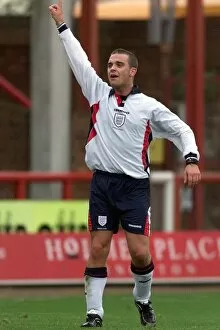 Images Dated 14th November 1999: Robbie Williams playing football November 1999 wearing a England kit for the first half
