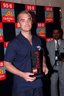 Images Dated 8th April 1998: Robbie Williams Singer April 1998 At the 98.5 Capital FM London Awards at The Royal