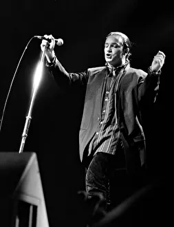 Rock group U2 in concert in USA - May 1987 Bono singing and playing guitar Rock group U2 in concert in USA - May 1987 Bono singing and playing guitar