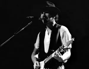 Rock group U2 in concert in USA - May 1987 The Edge singing and playing guitar Rock group U2 in concert in USA - May 1987 The Edge singing and playing guitar