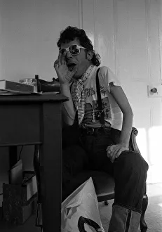 Images Dated 12th August 1981: Rock Star Ian Dury poses during an exclusive interview for the Daily Mirror in his