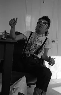 Images Dated 12th August 1981: Rock Star Ian Dury poses during an exclusive interview for the Daily Mirror in his