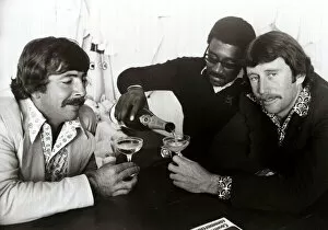 Images Dated 25th July 1975: Rod Marsh, Australian Cricketer having a glass of Champagne with Clive Lloyd