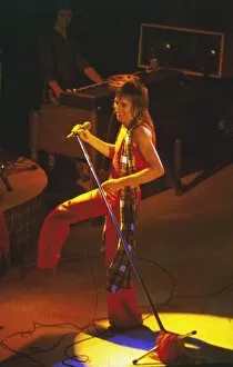 Images Dated 1st September 1979: Rod Stewart in Concert circa September 1979 Coloured light Rock Star