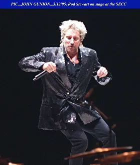 Rod Stewart dancing holding mike on stage SECC Glasgow Rod Stewart dancing holding mike on stage SECC Glasgow