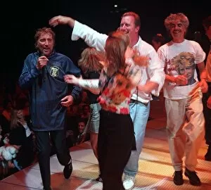 Images Dated 23rd May 1996: Rod Stewart pop star wearing a Scotland football strip singing on stage during his