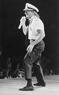 00054 Gallery: Rod Stewart ralies his fans at a live concert. The audiences sing the words to every song
