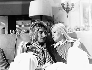 Images Dated 1st July 1975: Rod Stewart Rock Singer Songwriter with his girlfriend Britt Ekland July 1975