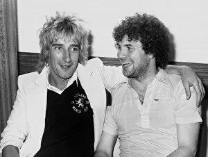 Images Dated 1st May 1978: Rod Stewart with striker Derek Johnstone. The pop superstar called in on the Scottish