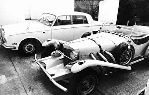 Images Dated 1st August 1975: Rod Stewarts Rolls Royce and Excalibur car in 1975 at his home in Windsor