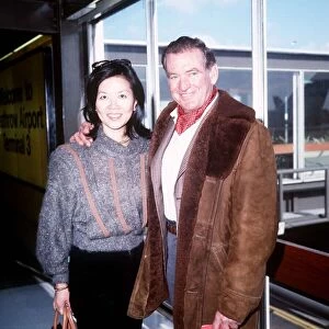 Rod Taylor and his wife Carol leave LAP for Los Angeles April 1985