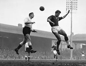 Striker Gallery: Roger Hunt beaten to the ball by Jackson of Lincoln City during the match at Anfield