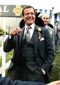 Images Dated 10th July 1989: Roger Moore Actor At The Epsom Derby Horseracing July 1989