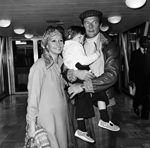 Roger Moore, off to Los Angeles from Heathrow Airport, is planning to a make a comedy Roger Moore, off to Los Angeles from Heathrow Airport, is planning to a make a comedy
