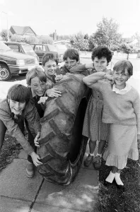 Roll em... Giving their giant tyre a last big push up these boys from Battyeford Roll em... Giving their giant tyre a last big push up these boys from Battyeford
