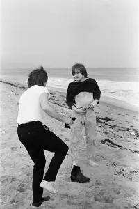The Rolling Stones. Charlie Watts and Brian Jones seen here posing on Malibu beach The Rolling Stones. Charlie Watts and Brian Jones seen here posing on Malibu beach