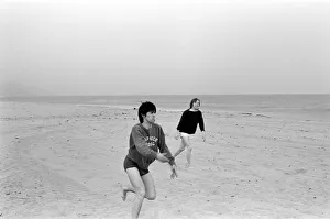 The Rolling Stones. Keith Richards and Brian Jones seen here posing on Malibu beach The Rolling Stones. Keith Richards and Brian Jones seen here posing on Malibu beach