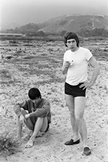 The Rolling Stones. Keith Richards and Charlie Watts seen here posing on Malibu beach The Rolling Stones. Keith Richards and Charlie Watts seen here posing on Malibu beach