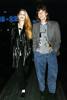 Images Dated 18th October 1993: Rolling Stones: Mick Jagger walks with wife actress model Jerry Hall in 1993
