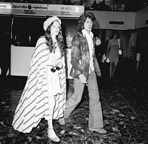Rolling Stones. Mick Taylor and girlfriend Rose Miller at Heathrow Airport