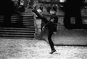 Images Dated 24th January 1982: Rowan Atkinson does goose step as german officer 1982 A©mirrorpix