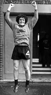 Jon Scan Gallery: Roy Aitken jumping in the air outside Celtic Park October 1980