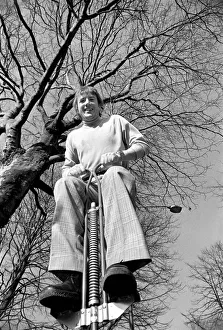 Roy Castle on a pogo stick. January 1975 75-00573-003 Roy Castle on a pogo stick. January 1975 75-00573-003
