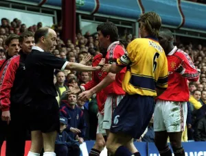 ROY KEANE IS RESTRAINED BY TONY ADAMS AFTER DISALLOWED GOAL FOR OFFSIDE IN THE FA CUP ROY KEANE IS RESTRAINED BY TONY ADAMS AFTER DISALLOWED GOAL FOR OFFSIDE IN THE FA CUP