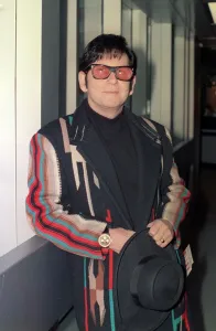 Images Dated 30th November 1988: Roy Orbison at Heathrow Airport November 1988 in multi coloured coat
