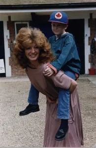 Rula Lenska British Actress Founder trustee of Angels International carrying her nephew Rula Lenska British Actress Founder trustee of Angels International carrying her nephew