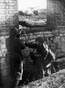 Russian tank destroyers directing their deadly fire at oncoming German tanks during Russian tank destroyers directing their deadly fire at oncoming German tanks during