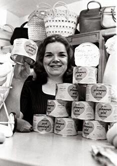 Salesgirl Delia Dixon showing off some of the tinned knickers she has on sale in her shop