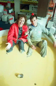 Images Dated 15th March 1991: Salesman John Cogger sitting in two hundred gallons of custard for Comic Relief at