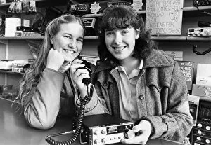 Samantha Bunnell (right) and her friend Jillian Carnell, try out a CB Radio