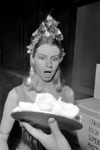 Sara Wade about to have a custard pie thrown at her. January 1970 Sara Wade about to have a custard pie thrown at her. January 1970