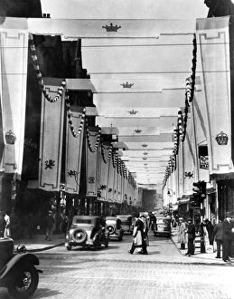 00864 Gallery: A scene of a street in preparation for celebrations of the coronation of King George VI