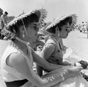 Scenes in Margate during a heatwave. Today's beach fashion, straw hats Scenes in Margate during a heatwave. Today's beach fashion, straw hats