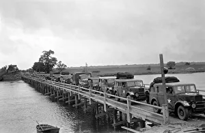 Scenes showing line of armured cars crossing the River as the British Army occupied Scenes showing line of armured cars crossing the River as the British Army occupied