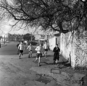 Scholars and choirboys of Llandaff Cathedral, South Wales, on their way to play rugby Scholars and choirboys of Llandaff Cathedral, South Wales, on their way to play rugby