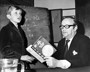 Images Dated 4th January 1971: School boy 9 year old Sebastian Head explains the new currency to presenter Jack de Manio